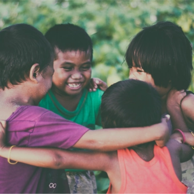 children in a circle displaying transformational generosity