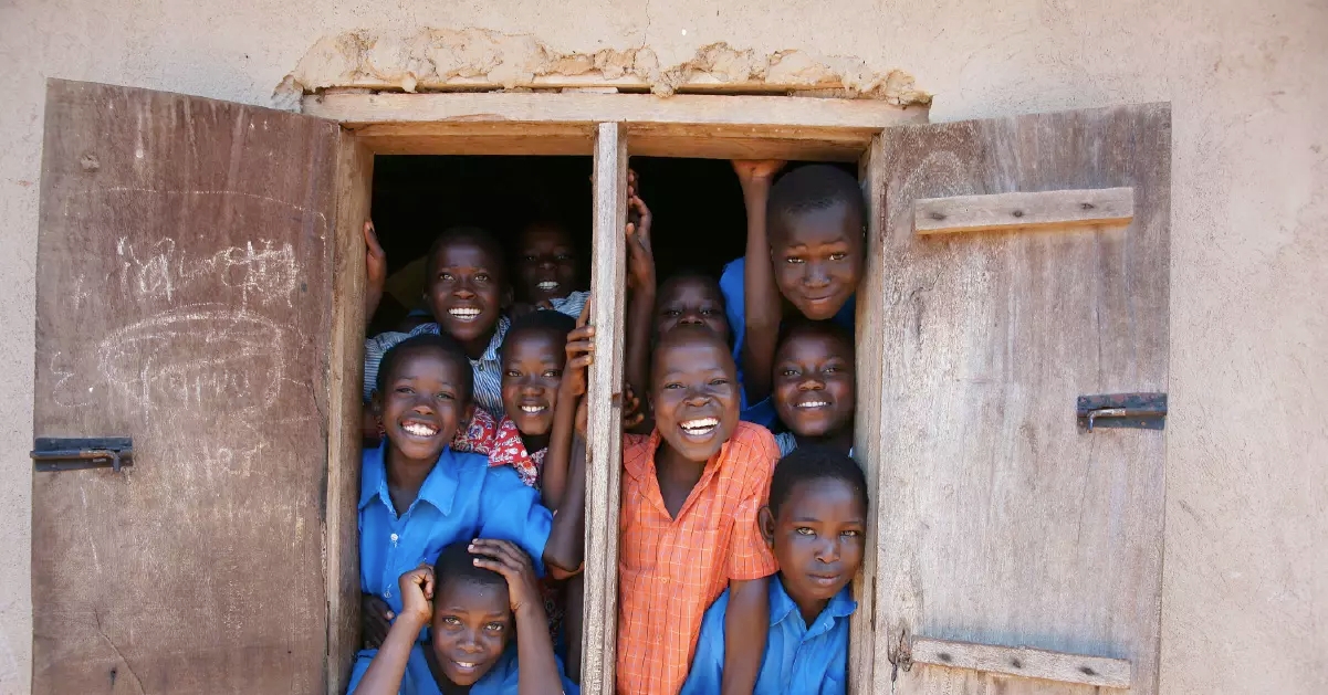 a group of children in a doorway